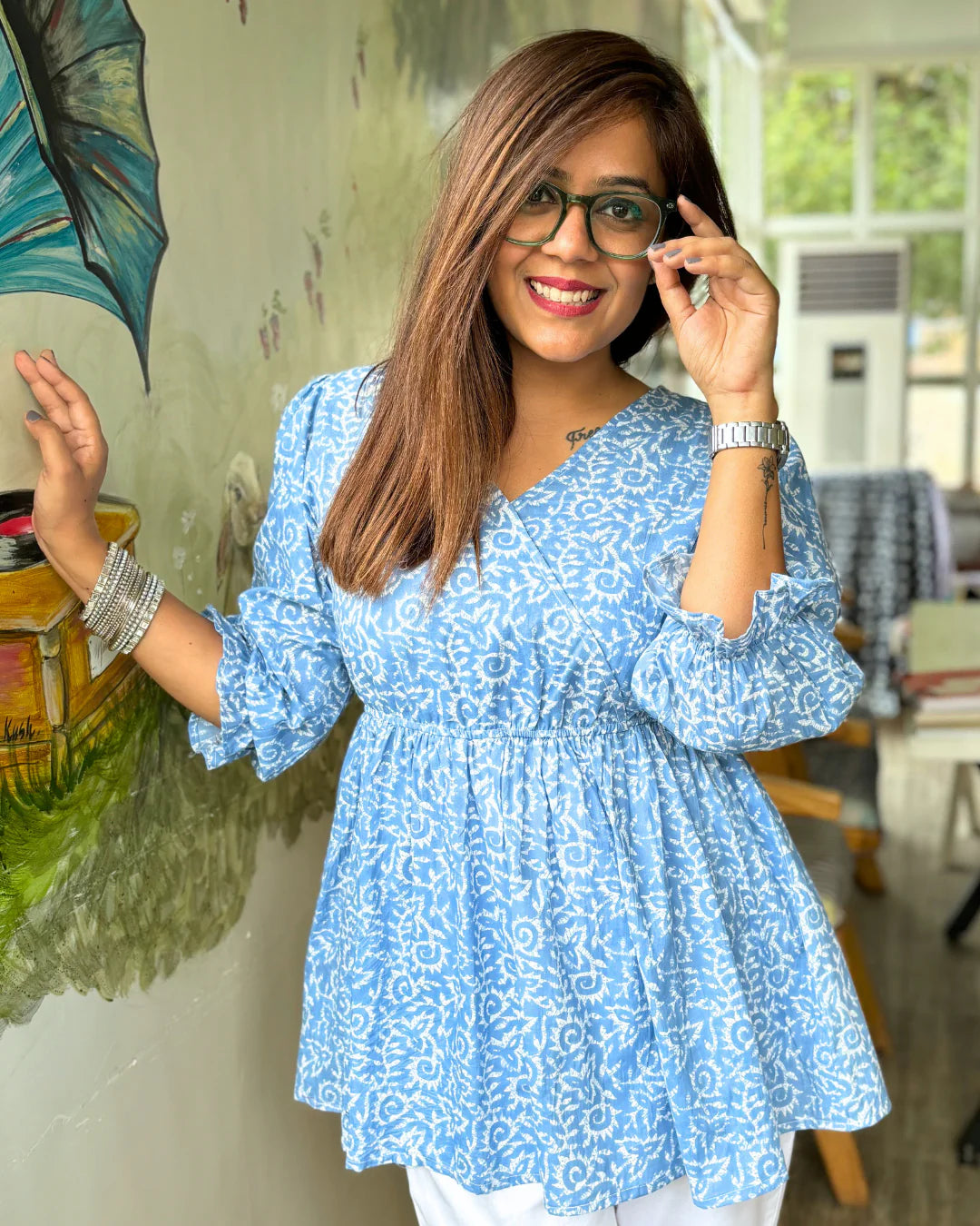 Light blue peplum top deals