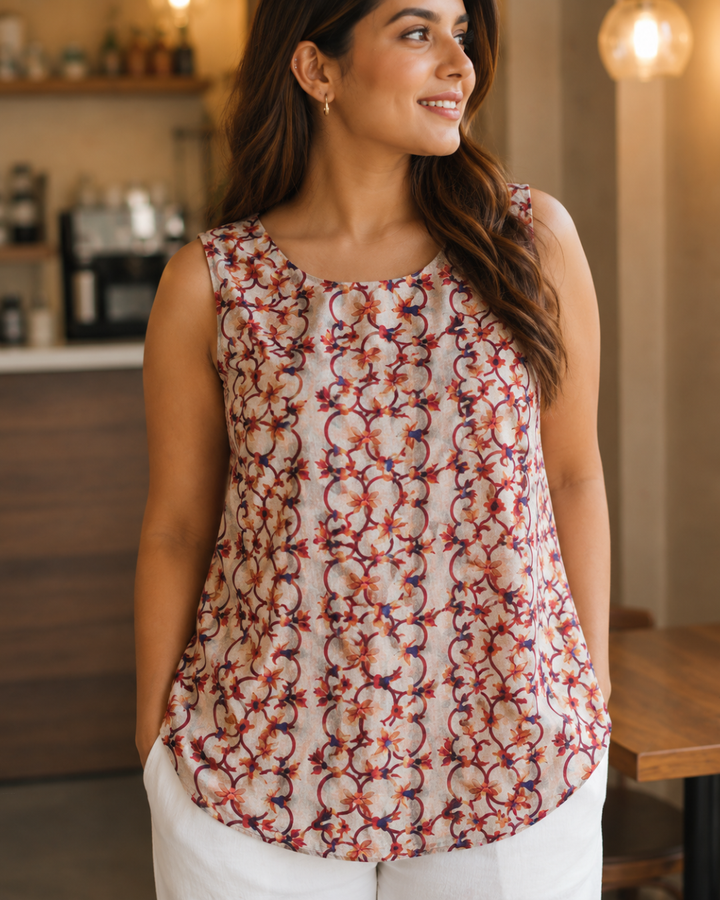 Off White Women's Sleeveless Back Tie Top With A Scoop Neck