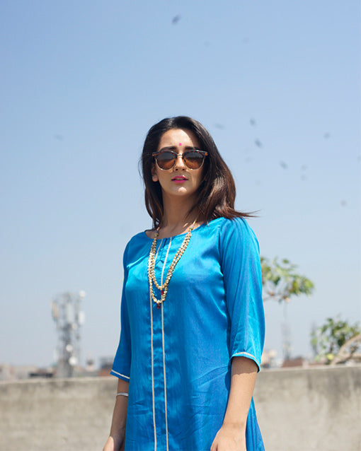 Go for this amazing Silk kurta dress.