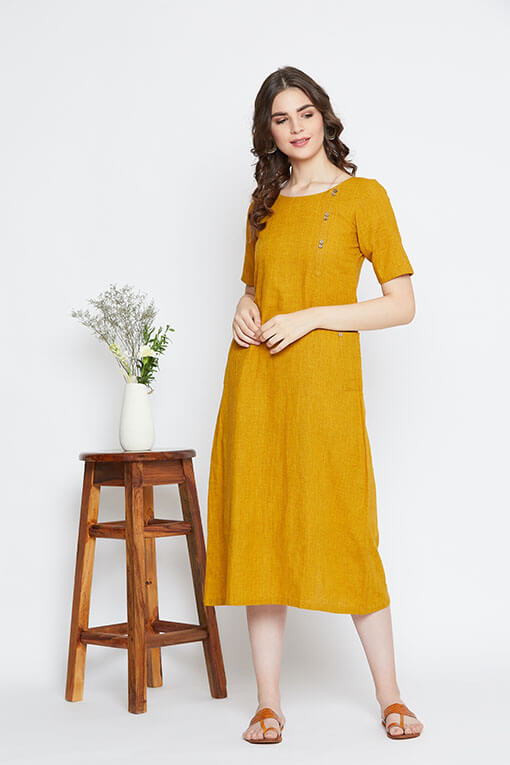 A mustard yellow shift dress for women in handloom cotton