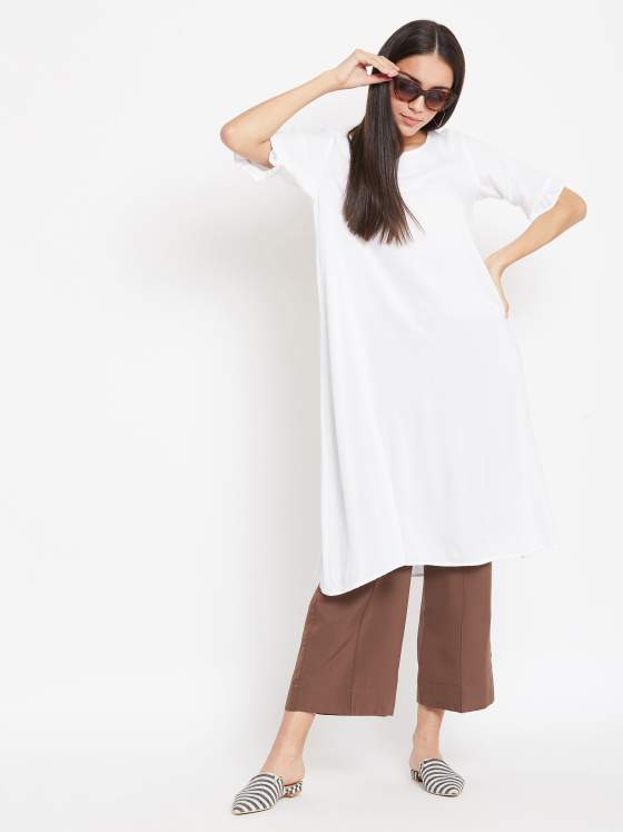 A white aline kurta and a pair of brown bottoms for women