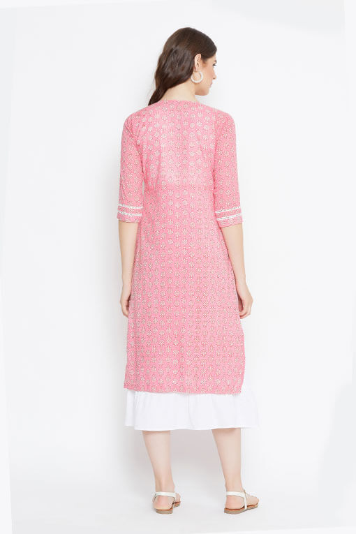 A cotton pink and white kurta and dress combination