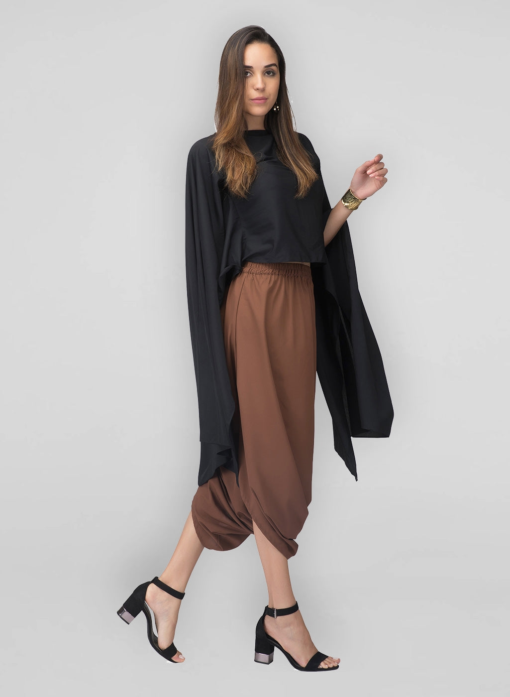 Step out in style wearing these lovely cowl pants with our flared top