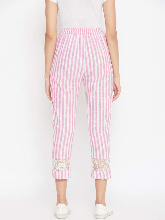 This cotton striped pant comes with a belt in the front & an elasticated waist in the back
