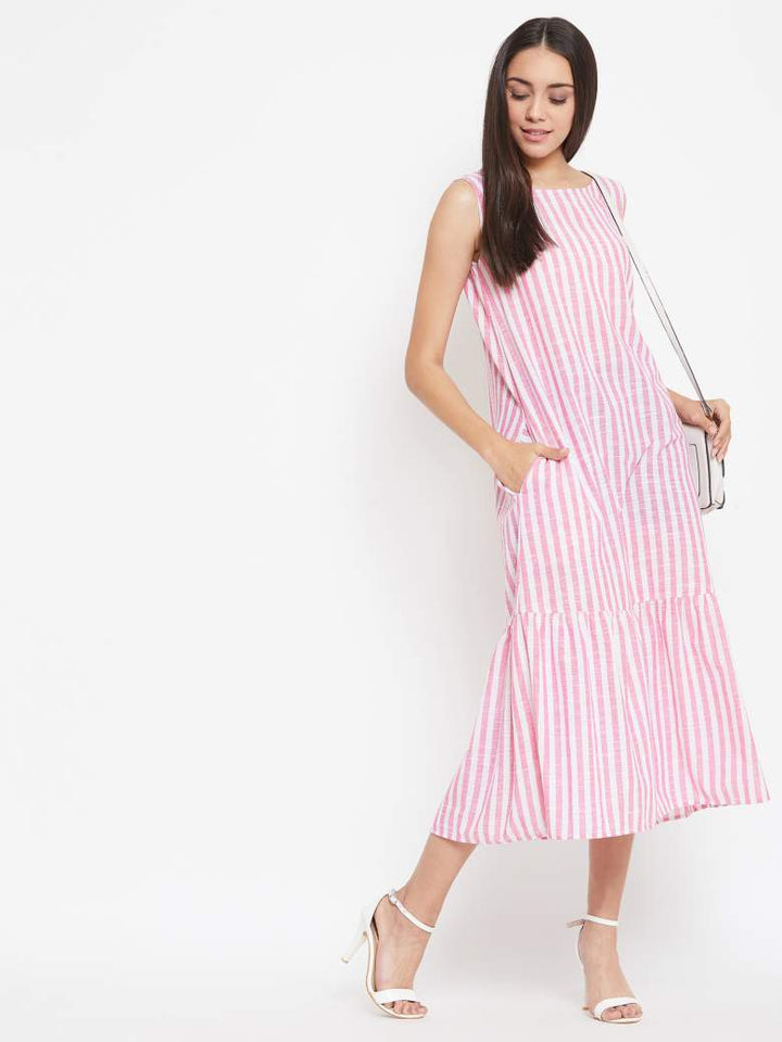A romantic long summer dress in pink vertical stripes