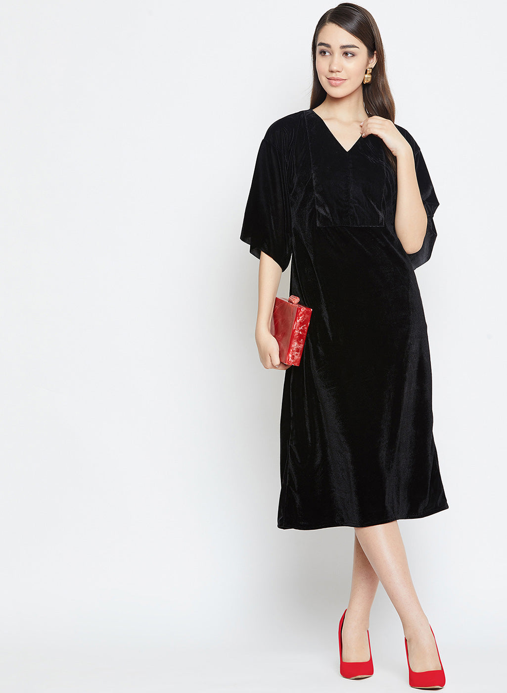 Color block your velvet dress for a chic date night look